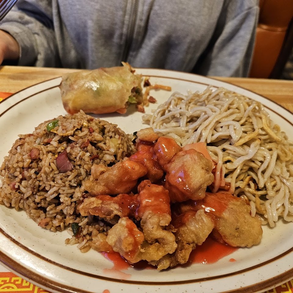 Menu page with appetizers and noodle dishes.