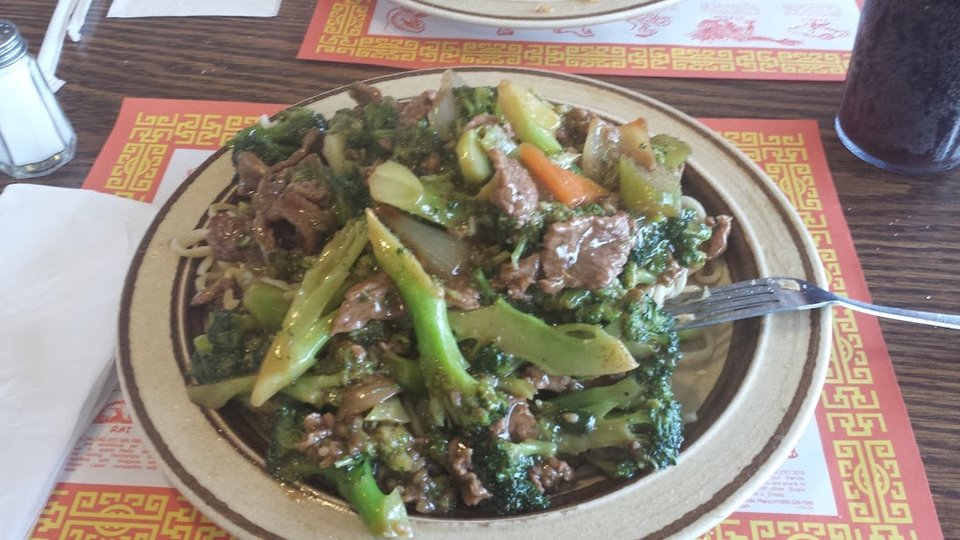 Restaurant menu listing soups, rice, and egg foo young.
